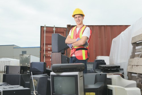 Workers sorting demolition materials for recycling