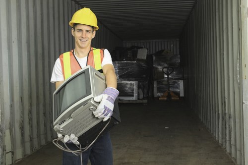 Professional team managing construction waste in Ickenham